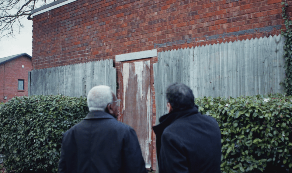  Standing over landscaped walkway that replaced the House of Horrors when it was razed in 1996, Sir Trevor McDonald paused to reflect in what would have been Fred West's garden