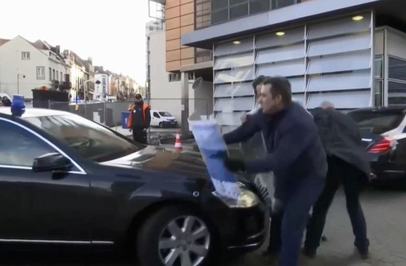  A protester threw himself in front of the PM's car