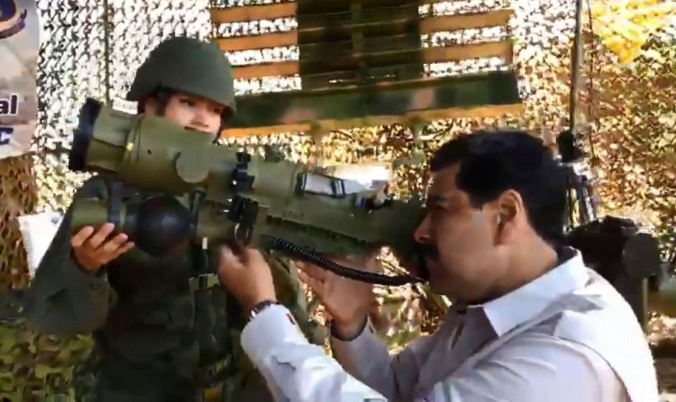  President Maduro looks through the sights of a powerful rocket launcher