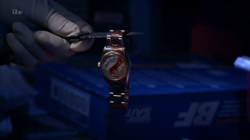  Graham planted the bloodied watch in Cain's garage