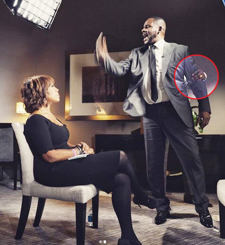  R Kelly appeared to be physically restrained as he loomed over CBS interviewer Gayle King