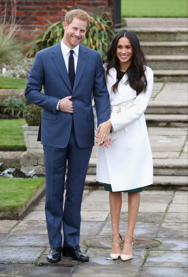  Prince Harry and Meghan Markle in the Sunken Gardens at Kensington Palace following the announcement of their engagement