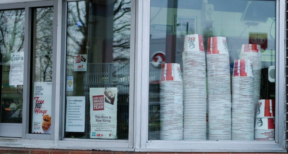  KFC drive-through in Lakeside, Essex, was closed with empty cartons stacked up behind the windows