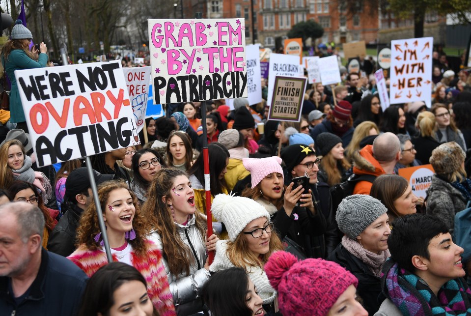  Thousands of women march past parliament during a 'March for Women' in London on March 4, 2018