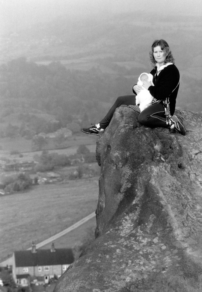  Mountaineer Alison Hargreaves pictured in October 1988 holding her four-day-old son Tom at Black Rock overlooking the Derbyshire countryside.