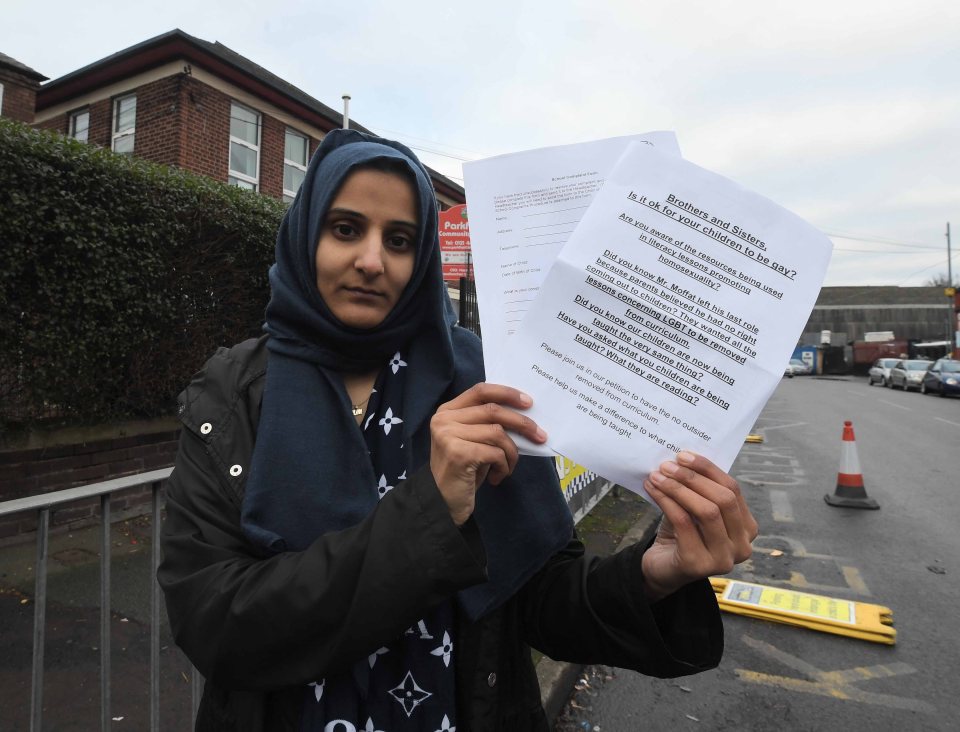  Speakers at the protest insisted they are not homophobic, pictured mum Fatima Shah holding up a petition