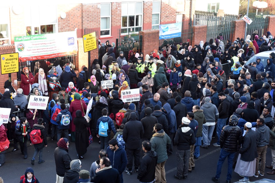  Outraged parents, pictured during a February 14 protest, say the school has misled them about the LGBT awareness course