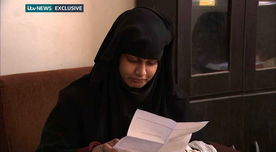  Shamima Begum fled the UK to join the Islamic State terror group in Syria when she was 15, in this photo she is being shown a copy of the Home Office letter which stripped her of her British Citizenship