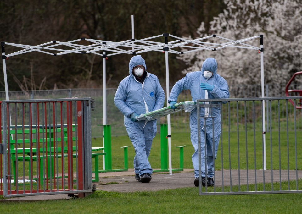 Police forensic officers remove a table and chairs at a play park in Harold Hill where Jodie Chesney was stabbed to death