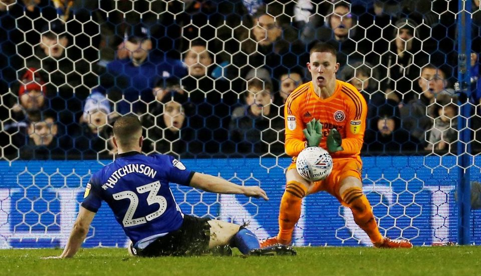  Blades keeper Dean Henderson thwarts Sam Hutchinson in a rare opportunity for the Owls