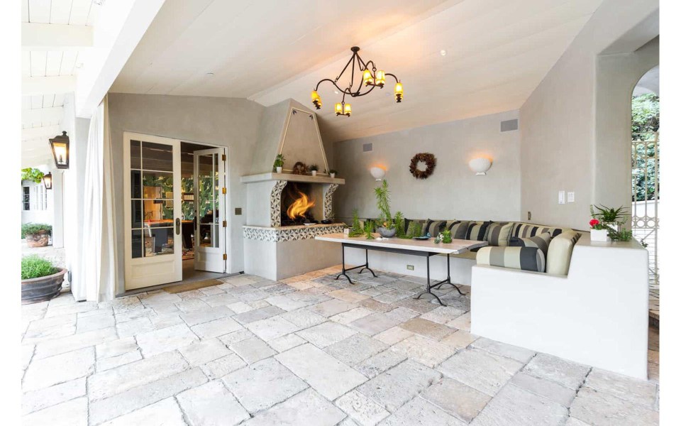  There is a stylish stone area in the garden for entertaining with an outdoor pizza oven