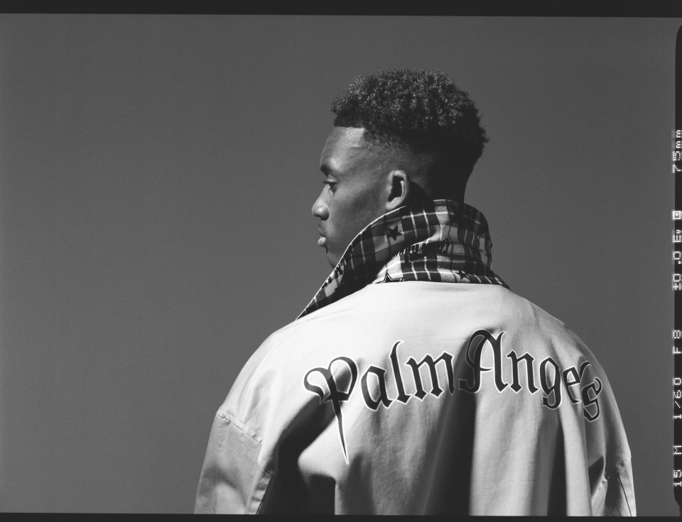  Blues winger Hudson-Odoi models a Palm Angels jacket