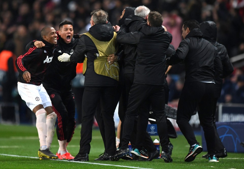 Ashley Young and Marcos Rojo join the bib-wearing Ole Gunnar Solskjaer celebrating the stunning win