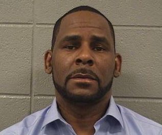 A mugshot pic of R Kelly as he was jailed over unpaid child support debt