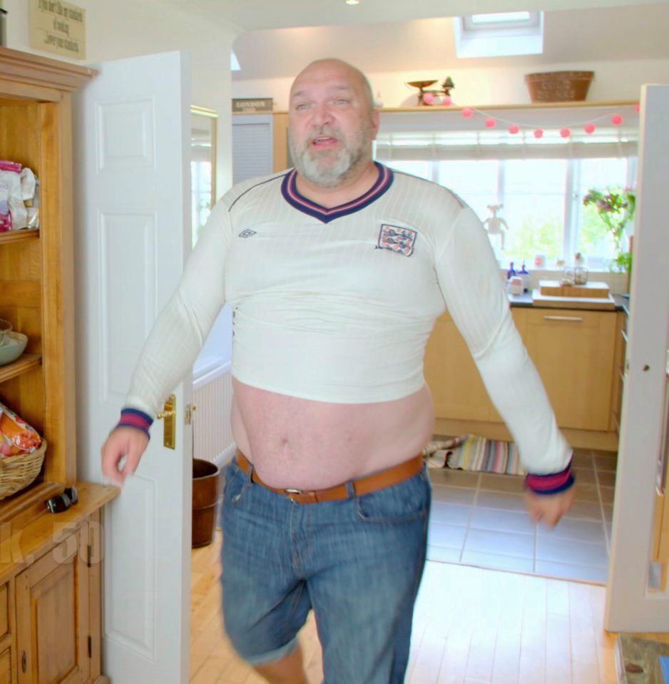  Neil was one of the heaviest with a body fat percentage of 32 - here he tries on one of his old England shirts