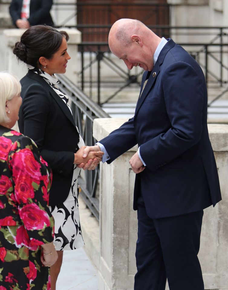  Sir Christopher greets pregnant Meghan, on International Women’s Day on March 8