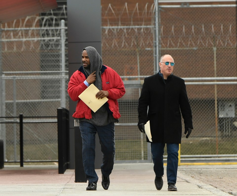  Singer R Kelly left, walks with his attorney Steve Greenberg in March this year