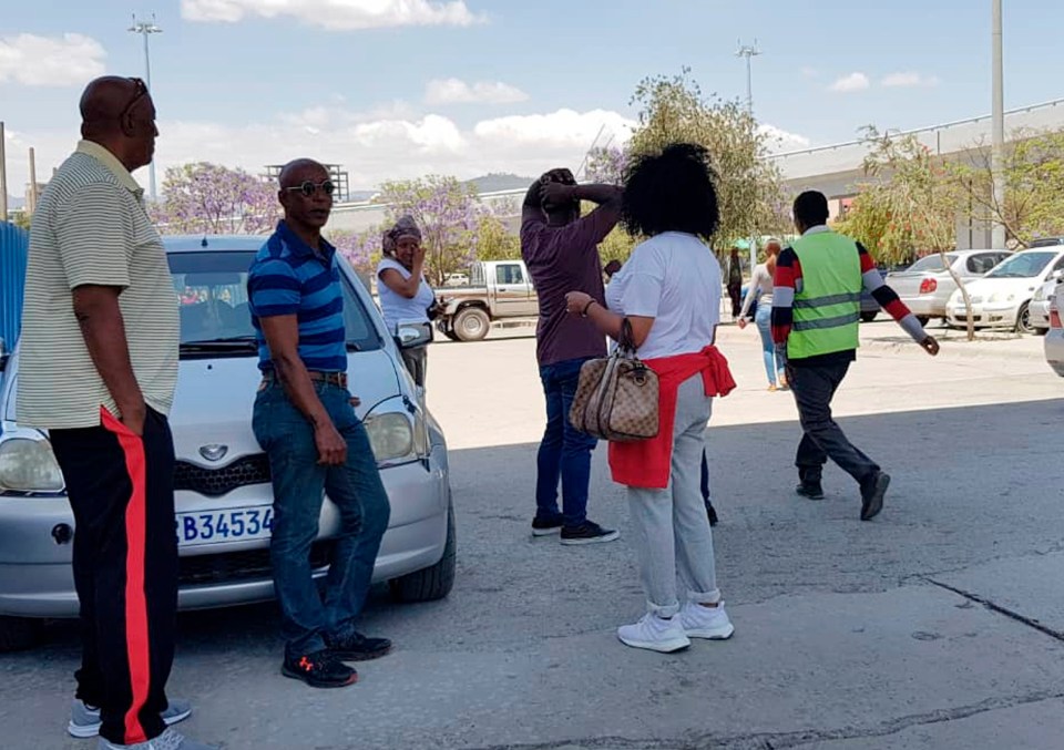 Friends and relatives gather at the airport in Ethiopia as news of the tragic flight spreads