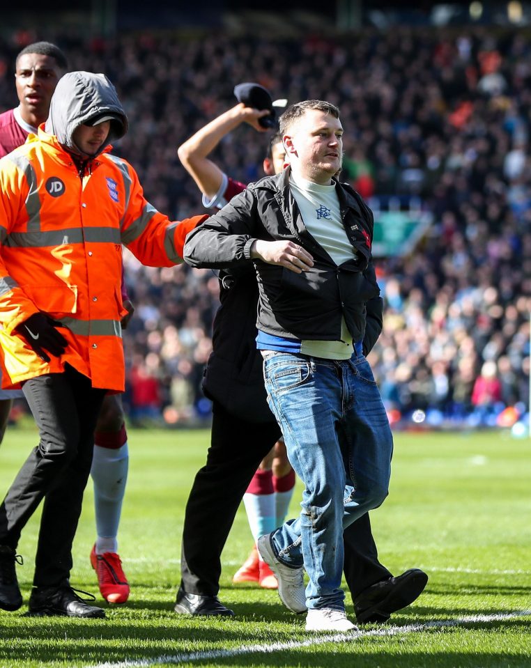  Mitchell was hustled off the pitch by stewards