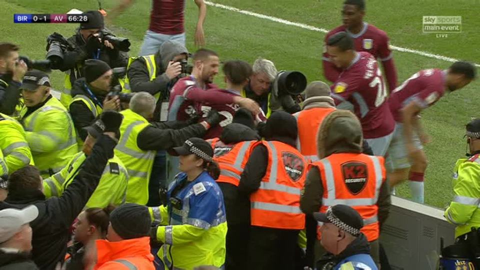  The steward looks as if he is shoving England youth international Grealish