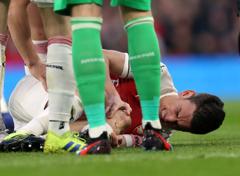  Laurent Koscielny was on the floor in agony after picking up a huge gash in his leg