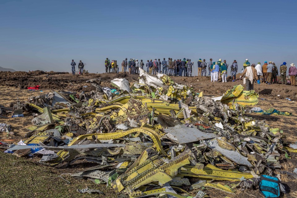  Workers have collected a huge pile of debris and also removed body parts and personal belongings