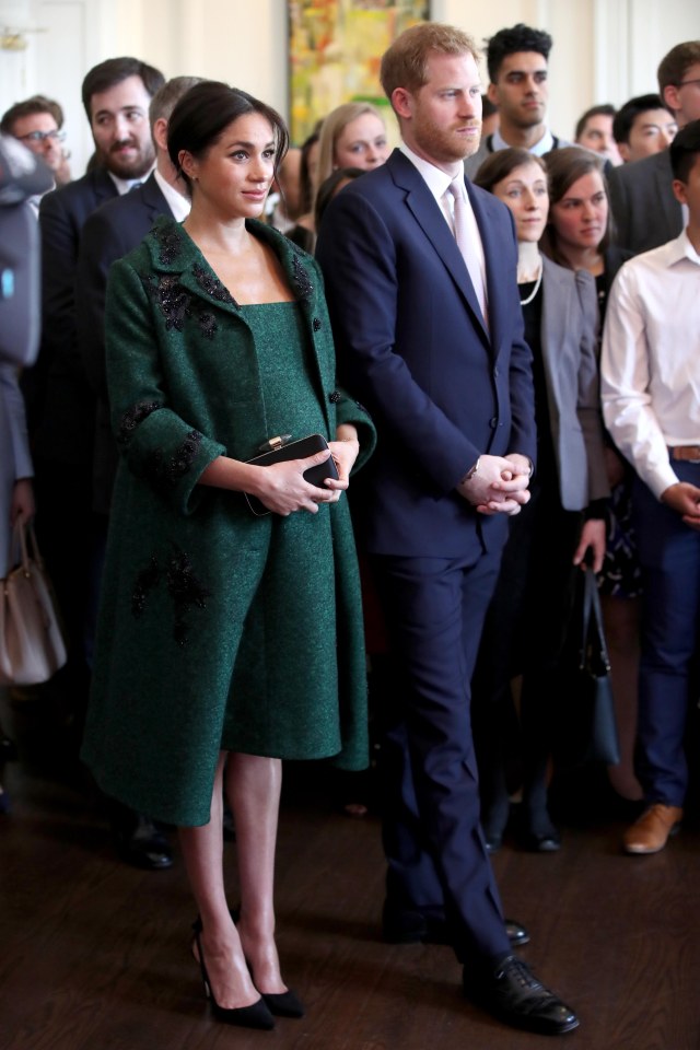  Meghan’s emerald green coat and coordinating dress were both bespoke, and tailored to her bump