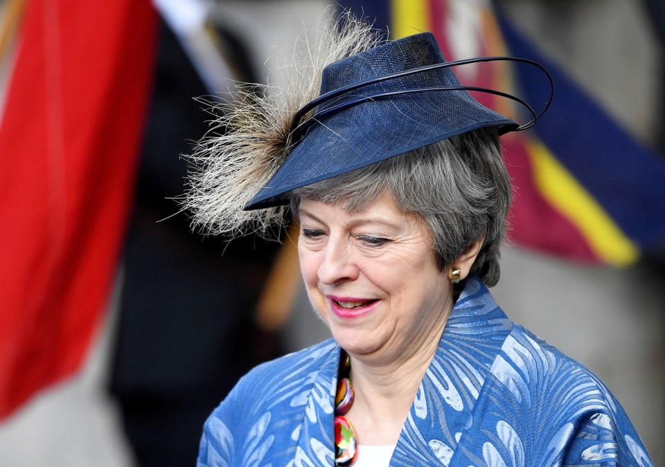 Theresa May headed off after addressing a Commonwealth Day reception in London