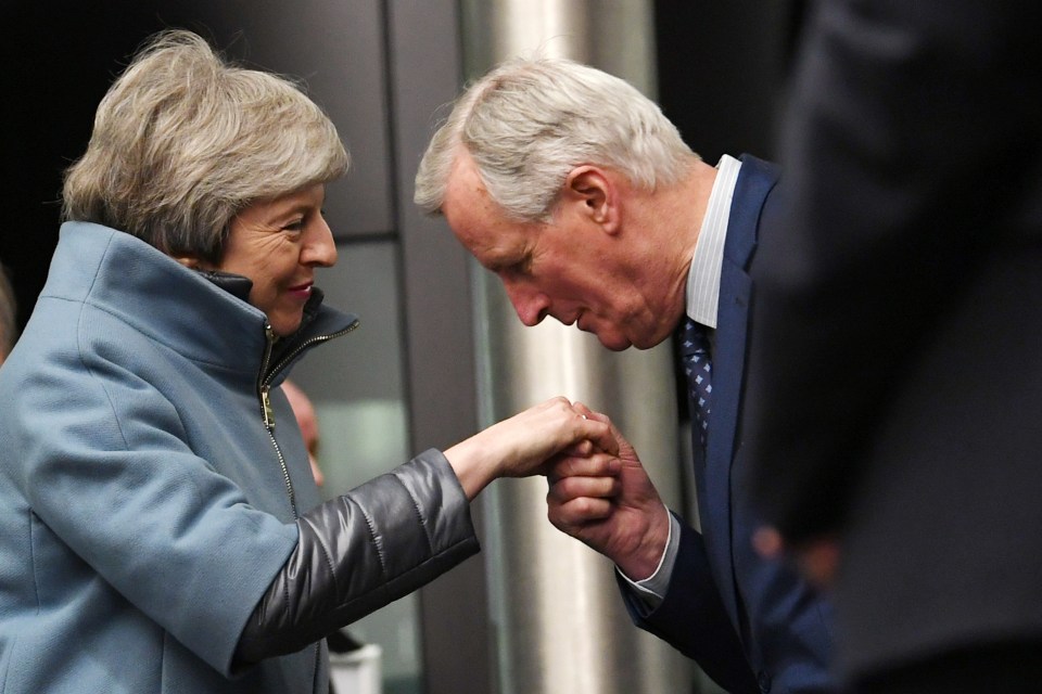 European Union’s chief Brexit negotiator Michel Barnier welcomes British Prime Minister Theresa May