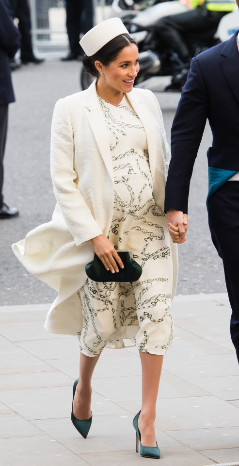  A designer she favoured during her pregnancy, Meghan stepped out in head to toe Victoria Beckham