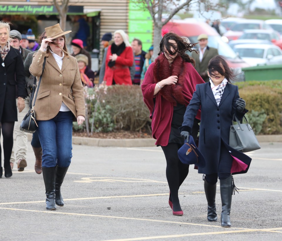  Strong winds threatened to blow hair and hats askew at the iconic racecourse on the second day of the meet