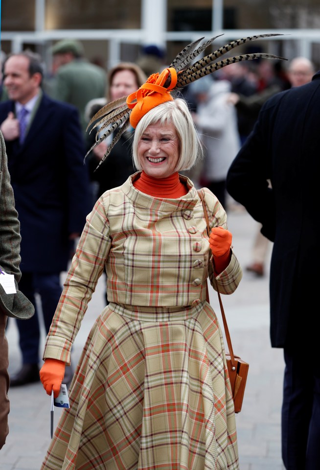  One woman set out to prove that orange really in the new black with this daring tartan-themed ensemble