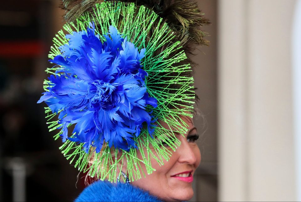  This blue and green headpiece added a splash of colour to an otherwise dreary grey day