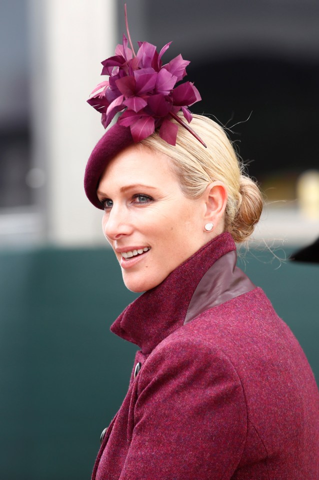  British equestrian Zara was a vision in purple, and looked pretty wearing a floral fascinator and matching coat