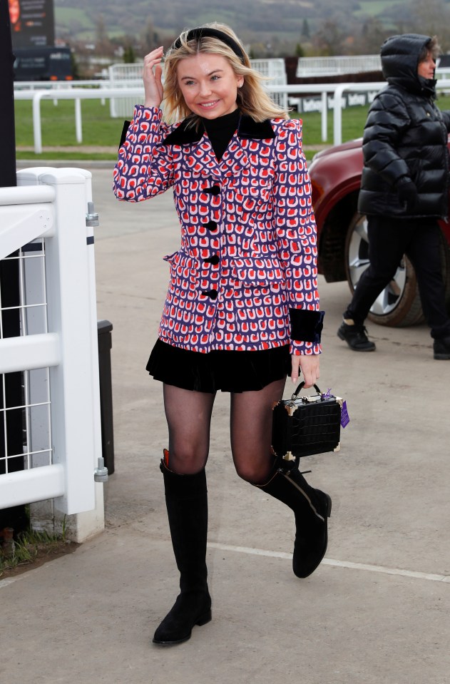  Georgia Toffolo grinned as she showed up at the racecourse wearing a patterned pink and purple coat