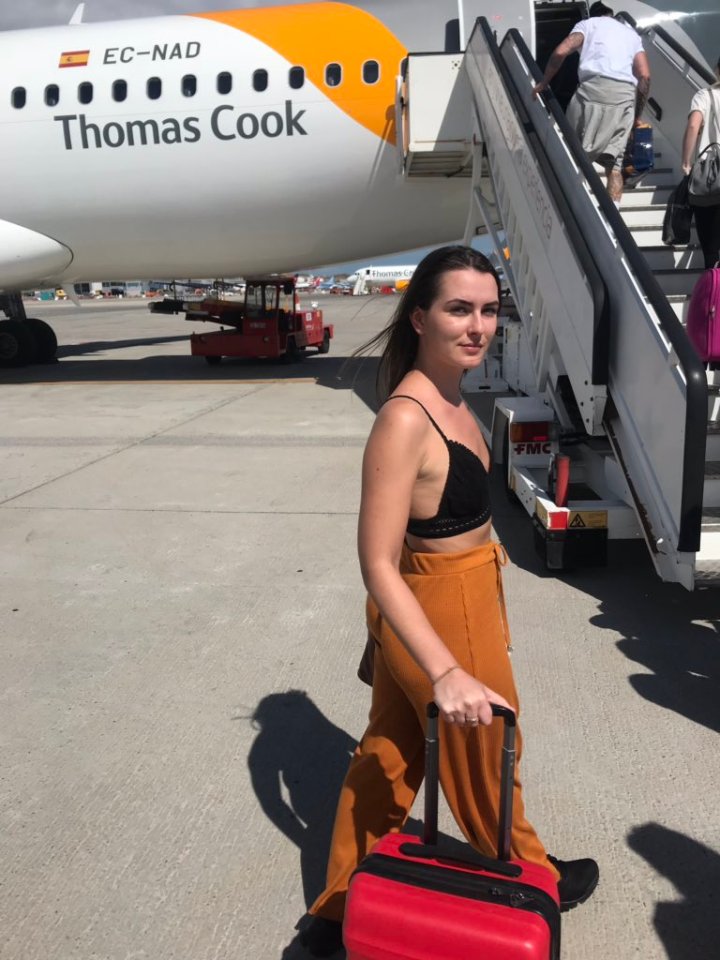  Emily says she had to cover up as she was told her outfit fell short of the airline's clothing policy