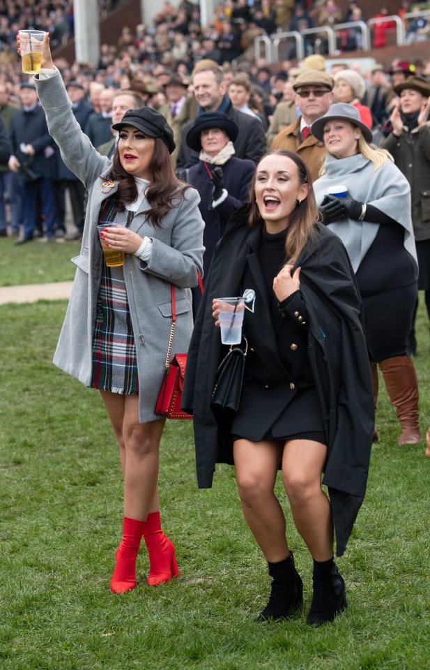  Revellers cheered on their horses as they co-ordinated wearing heels on the grass