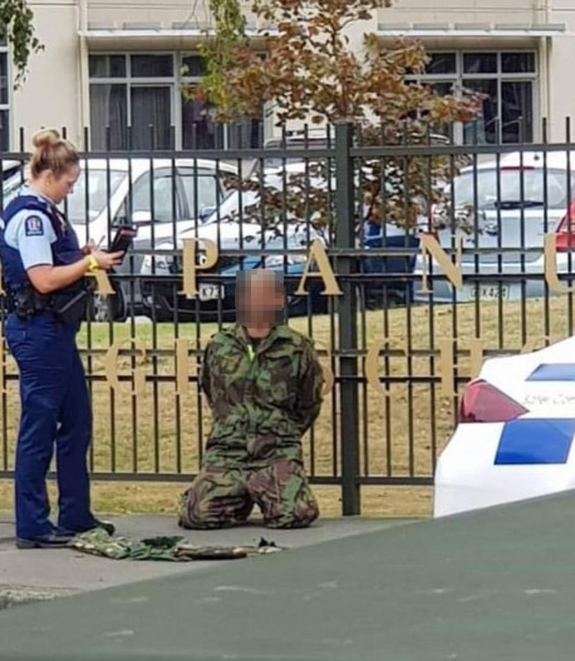  A man wearing fatigues was arrested outside a school