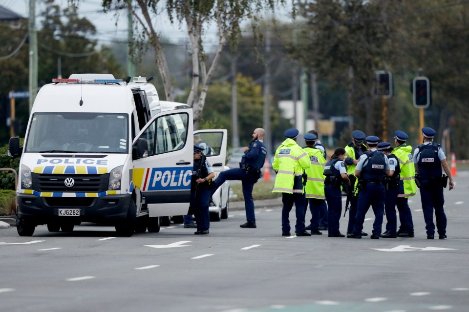  Police gather outside Linwood mosque in Christchurch where dozens of worshippers were murdered