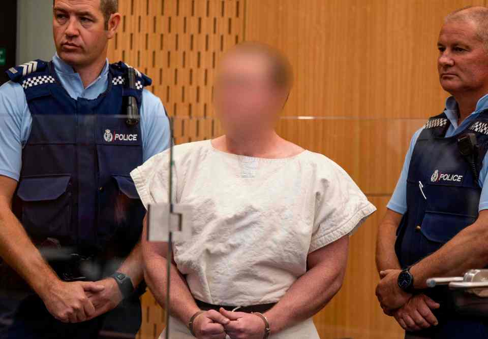  Mosque gunman Brenton Tarrant flashed a white power symbol as he appeared in court