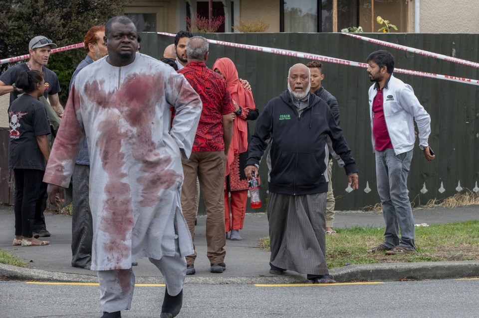  Imam Alabi Lateef Zirullah is seen covered in blood after warning worshippers to take cover during the Christchurch Mosque attack