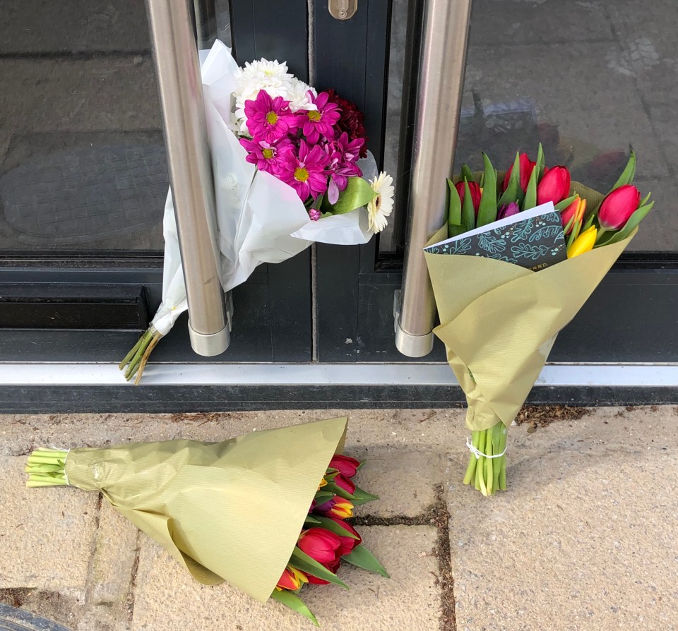  Flowers have been left outside the restaurant in the wake of Mike's death