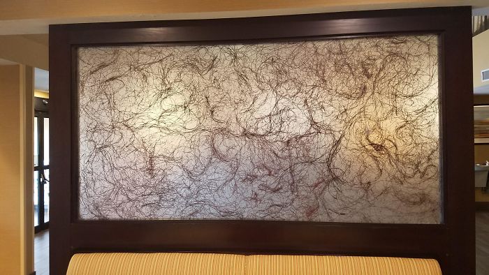  This bizarre, hairy artwork was spotted in a hotels dining room