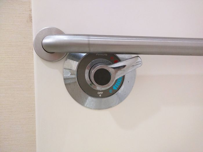  A warm shower was out of the question in this hotel as the handle blocked the temperature knob