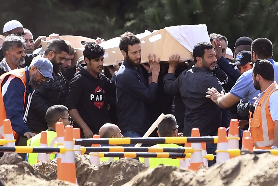  Mourners carry the coffin of one of the Christchurch terror attack victims