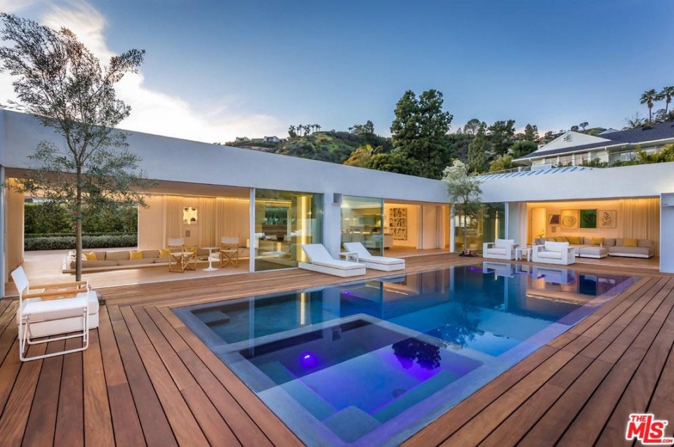  The zero-edge pool is surrounded by comfy chairs to soak up the LA sun