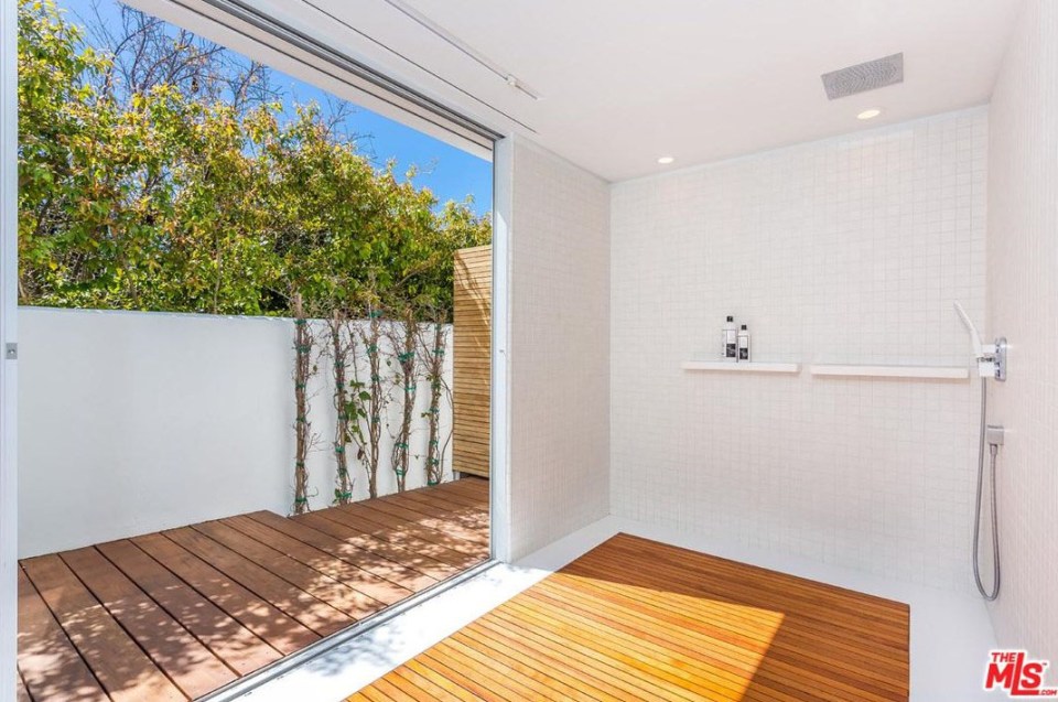  A gigantic wet room also leads out to the outdoor decking