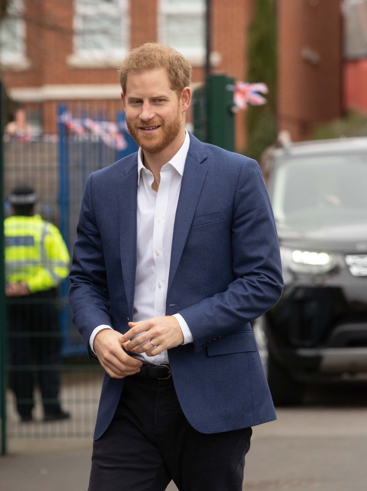  Prince Harry is rarely photographed alone with Prince George, claim two royal writers