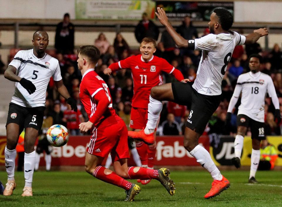  Ben Woodburn pounced at the death as a Wales side without several senior players snatched victory against outsiders Trinidad & tobago