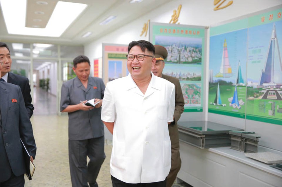  Dictator Kim Jong-un inspects plans for the Ryugyong Hotel in 2016